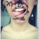 Illustration for article titled Girl transforms her mouth into cute famous characters with just makeup